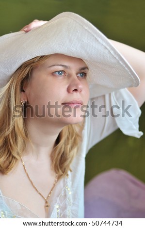 40 years old  women wearing straw hat