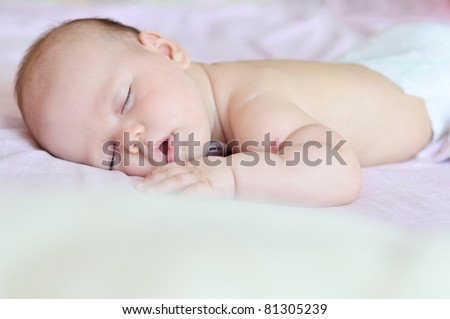 sweet dreams of baby girl in soft focus