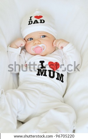 newborn girl wearing clothing with love to mum and dad (not trademark)