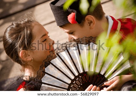 Lovely young couple having a discussion. More images with the same models.