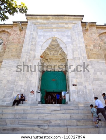BURSA, TURKEY - AUGUST 23: Worshipers gather in front of Great Mosque (Ulu Cami) at the prayer time on August 23, 2012. Great Mosque (Ulu Cami) is the largest mosque in Bursa.