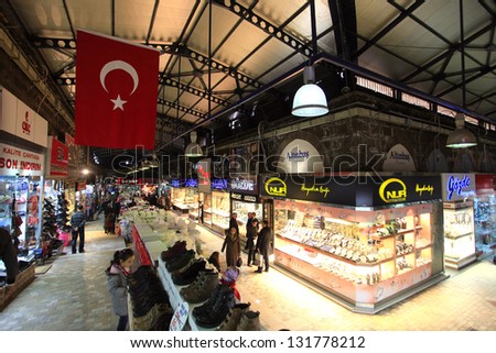 BURSA, TURKEY - MARCH 8: People shopping at Grand Bazaar on March 8, 2013 in Bursa, Turkey. Grand Bazaar was built in 14th century and second biggest bazaar after Istanbul Grand Bazaar in Turkey.
