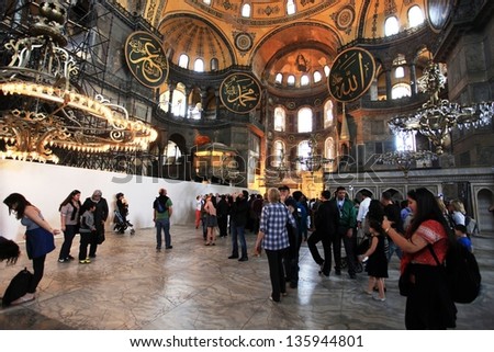 ISTANBUL,TURKEY - MARCH 31: Tourists visit Hagia Sophia on March 31, 2013 in Istanbul, Turkey. Hagia Sophia is a former Orthodox patriarchal basilica, later a mosque and now a museum.