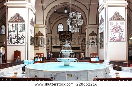 BURSA, TURKEY - SEPTEMBER 30: Interior view of Great Mosque (Ulu Cami) on September 30, 2014 in Bursa, Turkey. Great Mosque is the largest mosque in Bursa and a landmark of early Ottoman architecture.