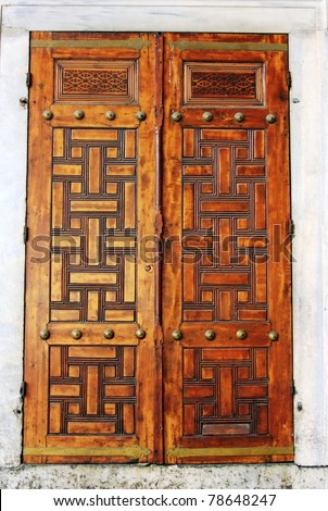 Closeup of ancient wooden doors in Blue Mosque-Istanbul