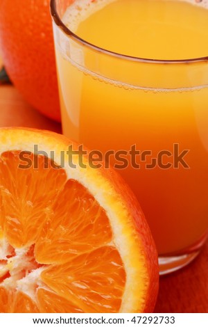 Orange juice and half orange