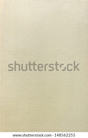 Cotton Rag paper, natural texture background, vertical copy space in textured beige sepia pattern macro closeup