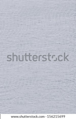 White medical bandage gauze texture, abstract textured background macro closeup, natural cotton linen fabric copy space in light blue