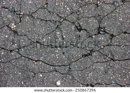 Old aged weathered cracked tarmac texture, large detailed damaged textured asphalt grungy background, horizontal grey, black rough grained, broken pattern macro closeup detail grunge copy space
