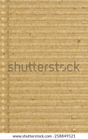 Corrugated cardboard goffer paper texture rough old recycled goffered textured blank empty grunge copy space background aged grungy macro closeup taupe brown tan yellow beige vertical vintage pattern