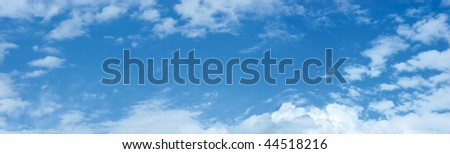 Panoramic photo of blue sky and clouds pattern copy space, cloudscape panorama