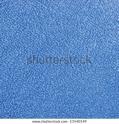 Natural blue plush terry cloth turkish bath / beach towel, textured fabric macro background closeup