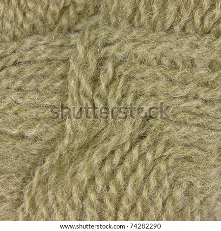 Natural beige fine wool threads texture, clew macro closeup rustic background