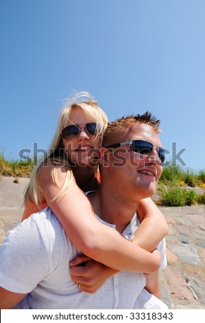 Young couple having fun in the sun