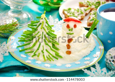 funny christmas breakfast with christmas tree and snowman made from cheese and chive for child