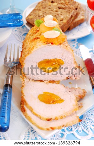 Roasted pork loin with dried apricots and almonds