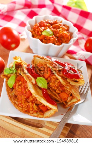 pancakes stuffed with minced meat,carrot,leek ,pepper and tomato