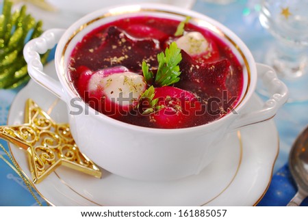 traditional polish red borscht with mushroom filled ravioli for christmas eve dinner