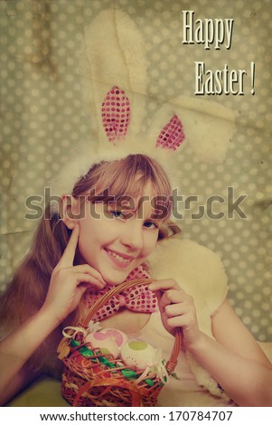 vintage easter bunny girl with funny ears holding eggs  in the basket