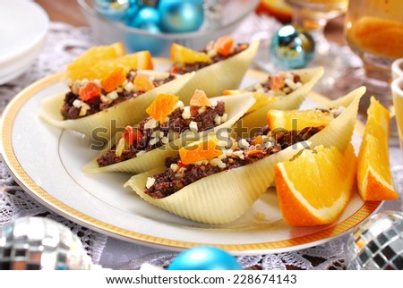 pasta shells stuffed with poppy seeds,nuts,dried fruits and honey for christmas dessert