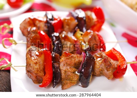 grilled turkey meat, red pepper and eggplant skewers with teriyaki sauce