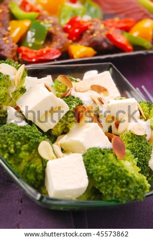 healthy broccoli salad with feta and flaked almonds