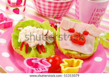 breakfast with cottage cheese for child with sheep and pig  shape sandwich