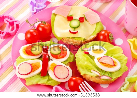 breakfast with cottage cheese for child with butterfly,dog  and chicken  shape sandwich