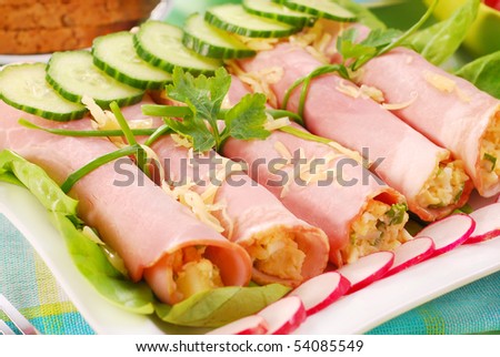 rolled ham stuffed with egg ,cheese and chive salad