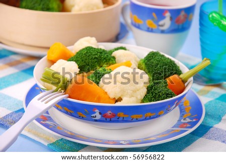 steamed broccoli,carrot and cauliflower  for baby in bowl