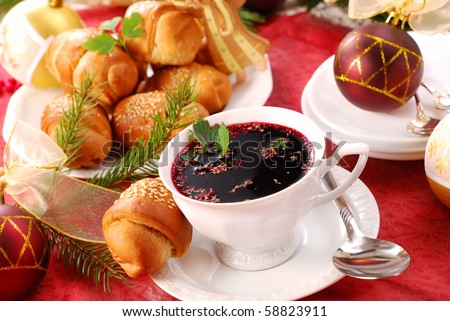 traditional red borscht and yeast pastries with mushrooms filling for christmas eve