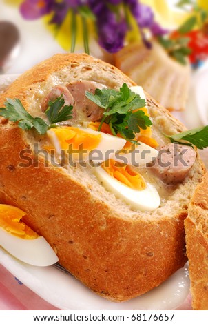 white borscht with eggs and sausage in bread bowl for easter