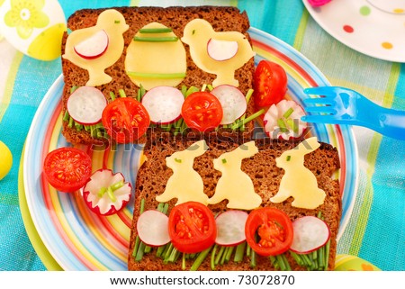 funny easter breakfast with bunny and chicken shape on sandwich for child