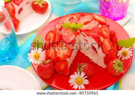 cold cheesecake with strawberries in ball shape