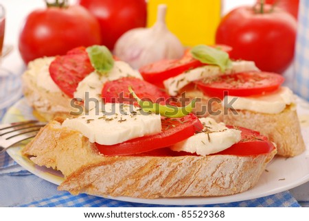 italian crostini bread with mozzarella and tomato for diet breakfast