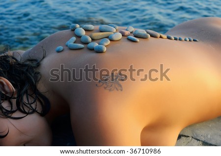 Stone ornament on girl's back