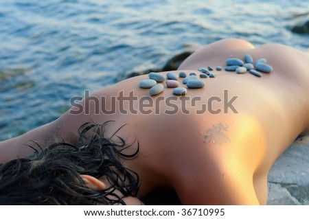 Stone ornament on girl\'s back