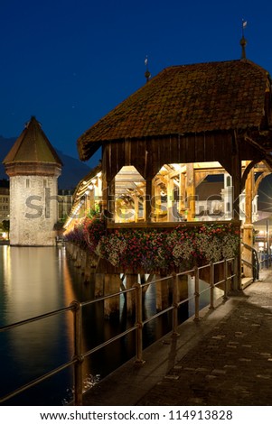 Night view on Chapel Bridge and Water Tower in Luzern, Switzerland. GPS information is in the file