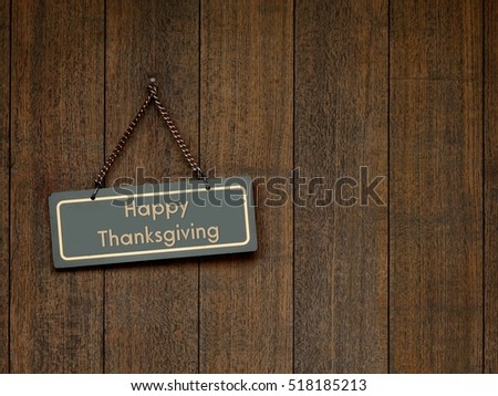 happy thanksgiving - message / text on the background of vintage wood door