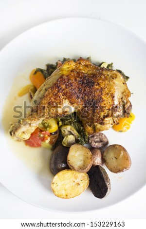 Braised chicken whole chicken thigh and kale with roasted potatoes Braised Chicken, Carrots, Potatoes and Kale