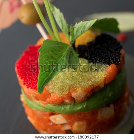 Rainbow tartar.  Tuna, salmon and yellow tail mixed with green apple and avocado