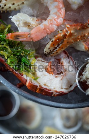 A Seafood Tower with shrimp, crab and oysters