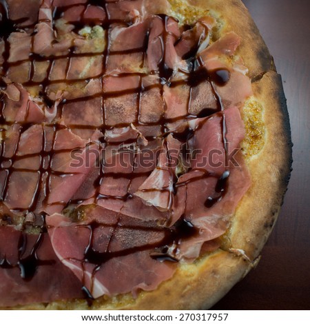 FIG AND PROSCIUTTO PIZZA. Prosciutto di Parma, fig jam, gorgonzola and fresh basil