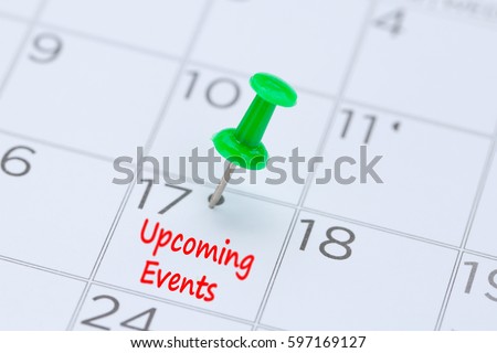 Upcoming Events written on a calendar with a green push pin to remind you and important appointment.