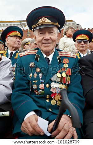 MOSCOW - MAY 9: Smiling World War II veteran Shishkin V.I. on Victory Day celebration, May 9, 2011, Moscow, Russia. Veteran is awarded with numerous of military orders and medals.