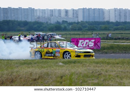 MOSCOW - JUNE 11: Racing car of V.Gukasyan on the track in 3-d tour in summer cup of Megafon mitjet race at Moscow racetrack MegaFon Tushino Ring, June 11, 2011, Moscow, Russia.