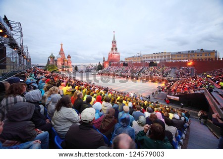 MOSCOW - SEPTEMBER 4: Spectators and Orchestra of Air Force of Greece at Military Music Festival Spasskaya Tower on September 4, 2011 in Moscow, Russia.