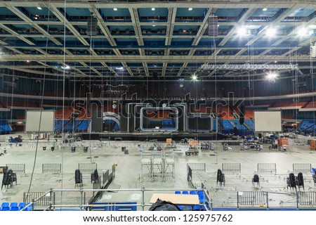 MOSCOW - DEC 18: Workers dismantle stage and stage equipment after music festival Legends of Retro FM at Sports Complex Olimpiyskiy, Dec 18, 2011, Moscow, Russia.