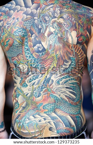 MOSCOW - MAY 20: Tattooed back of one of participants of V Moscow International Tattoo Convention 2012, May 20, 2012, Moscow, Russia. Convention was organized by Tattoo Studio Angel.