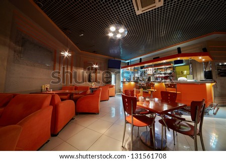 Empty cafe-bar in orange tones